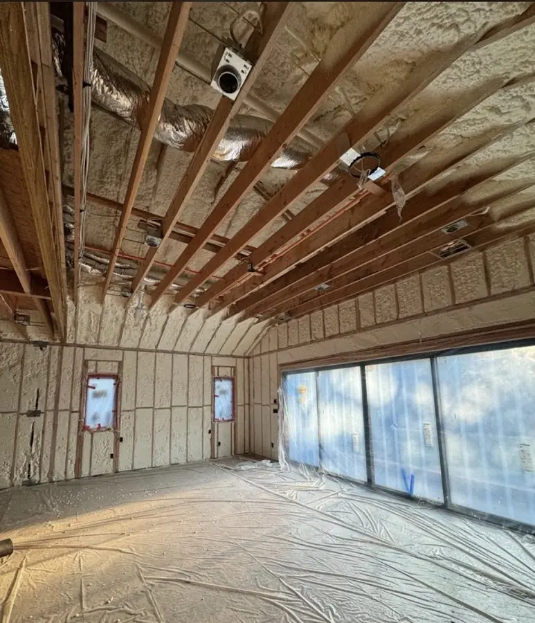 Interior walls and ceiling insulated with spray foam during new construction in Hempfield